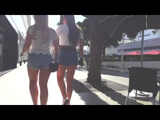 candid voyeur blond and brunette duo in short shorts